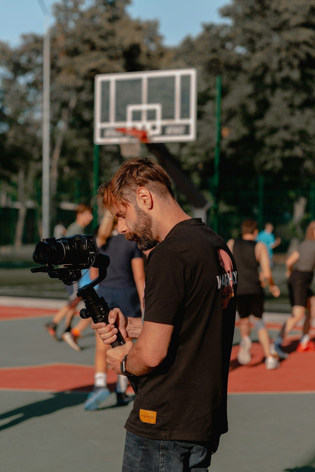 Group training session with an instructor and trainees holding cameras