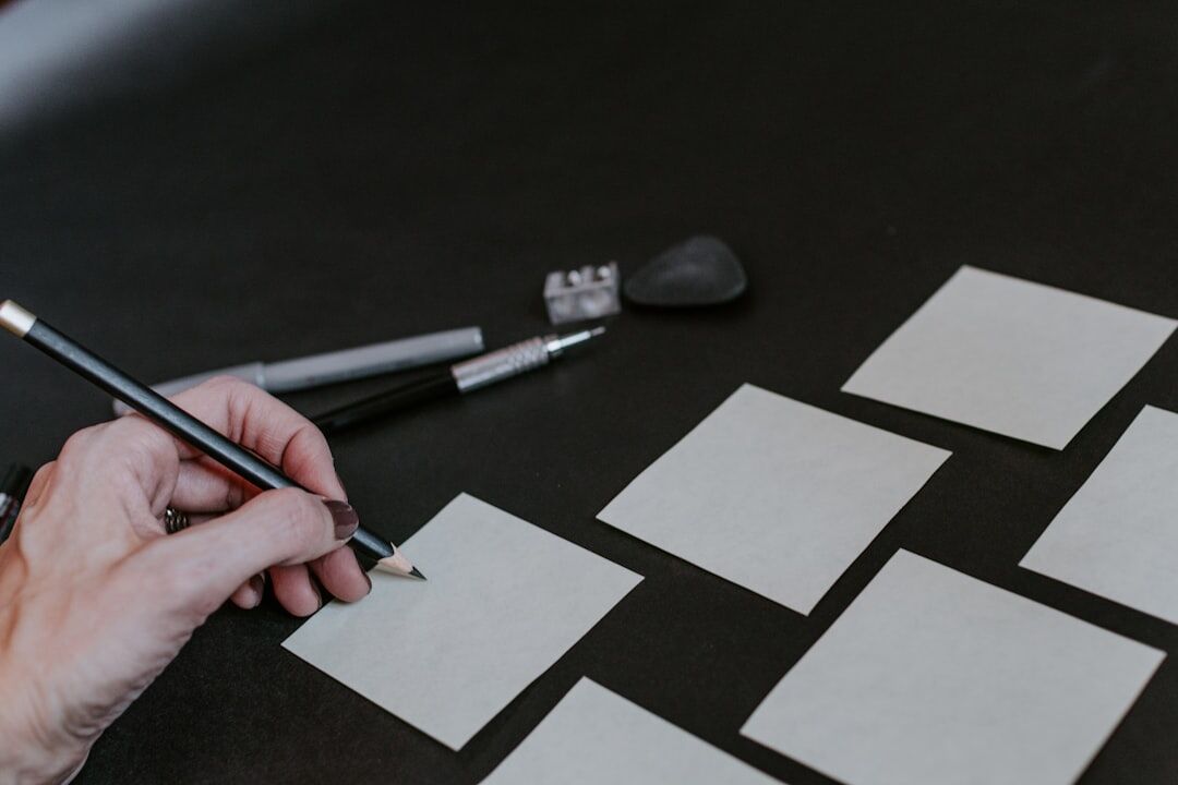 Journalist planning a shoot with notes and a storyboard on a desk