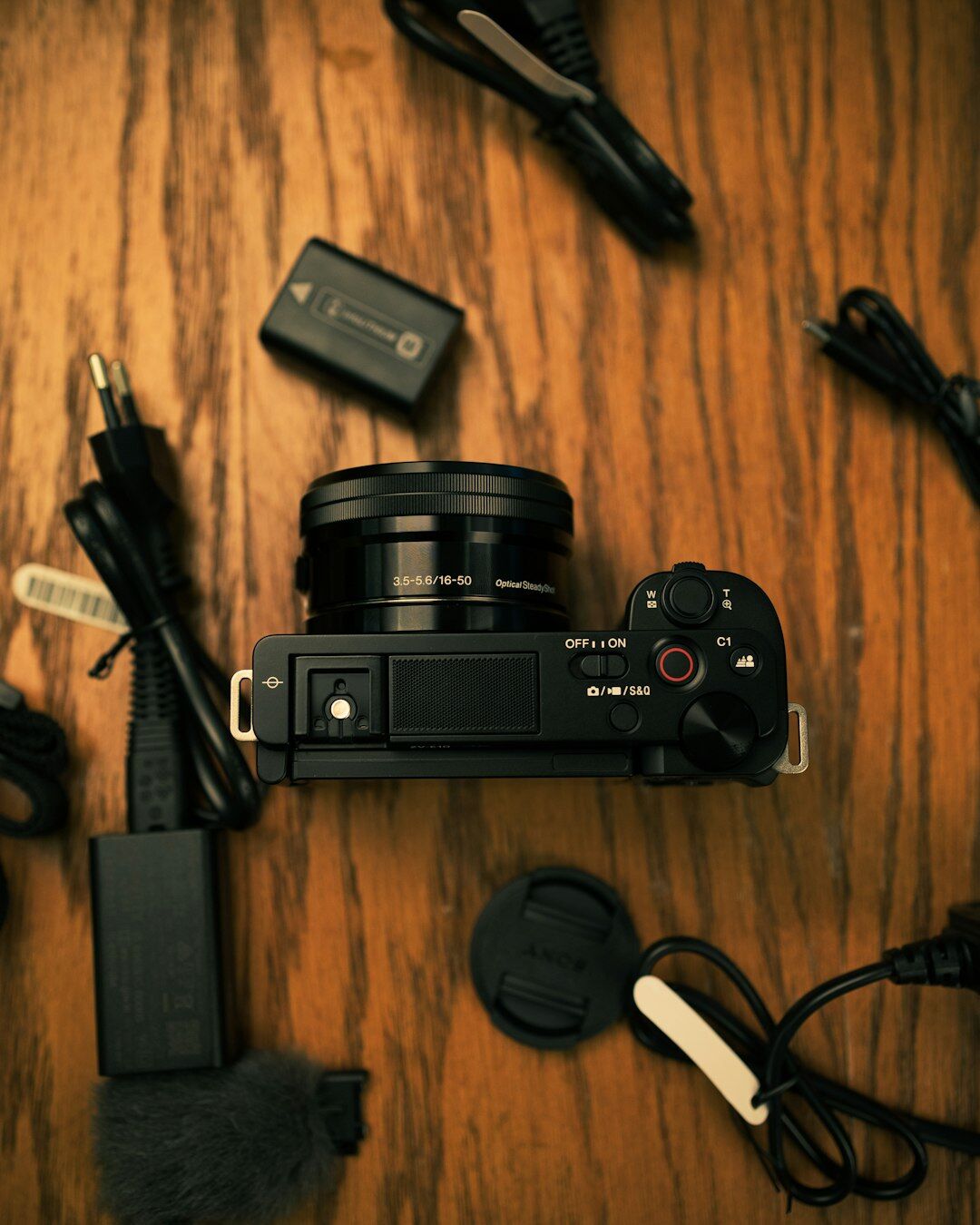 Close-up of compact camera and microphone equipment on a table
